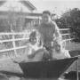 geoff_helen_and_i_in_wheelbarrow_hydes_creek.jpg